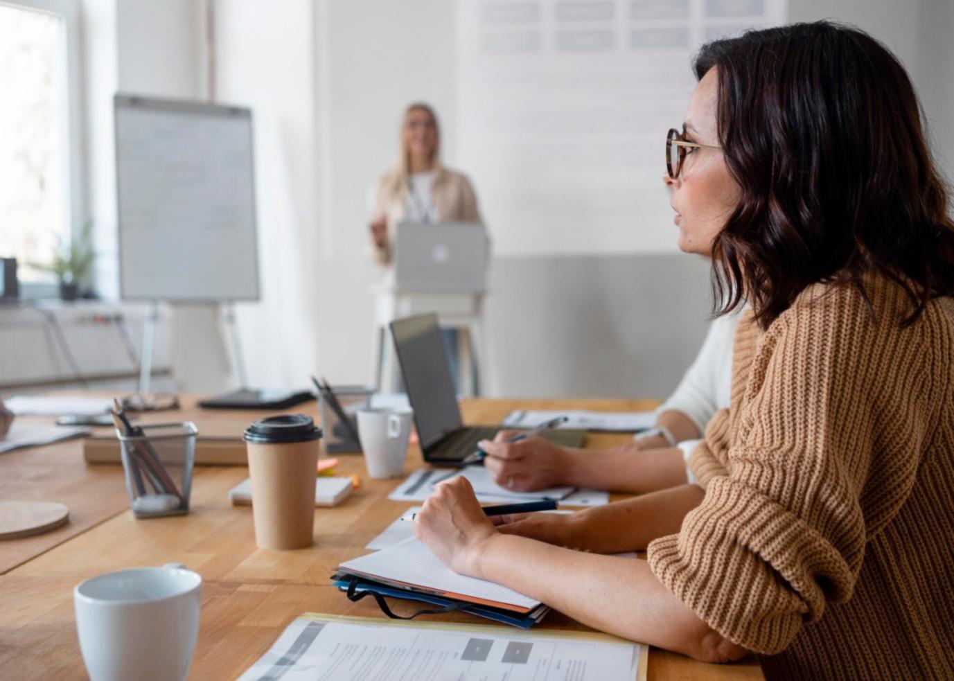 Financial analysis workspace showing detailed business performance charts and documents